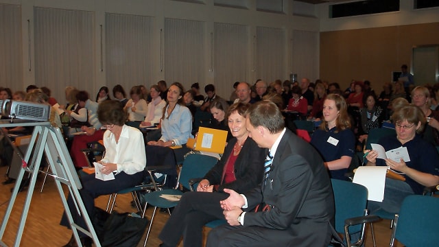 Participants at a symposium